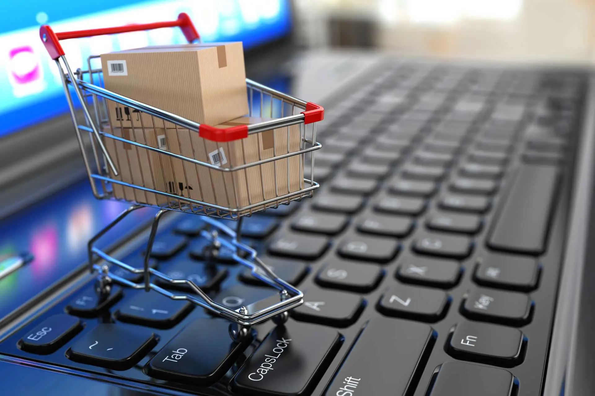 Foto de una carrito de la compra sobre un teclado